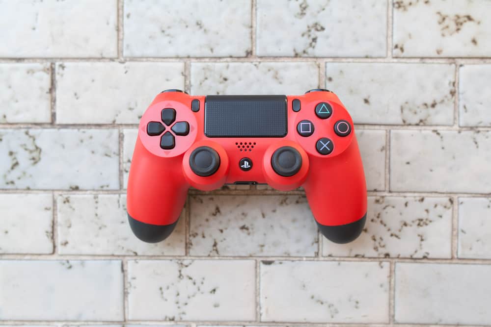 Взято новий контролер червоного кольору sony dualshock 4 для PlayStation 4